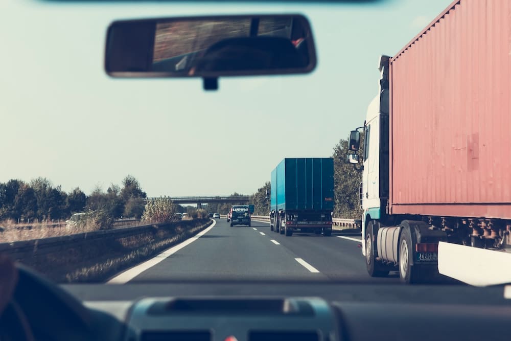 commercial trucks on a highway