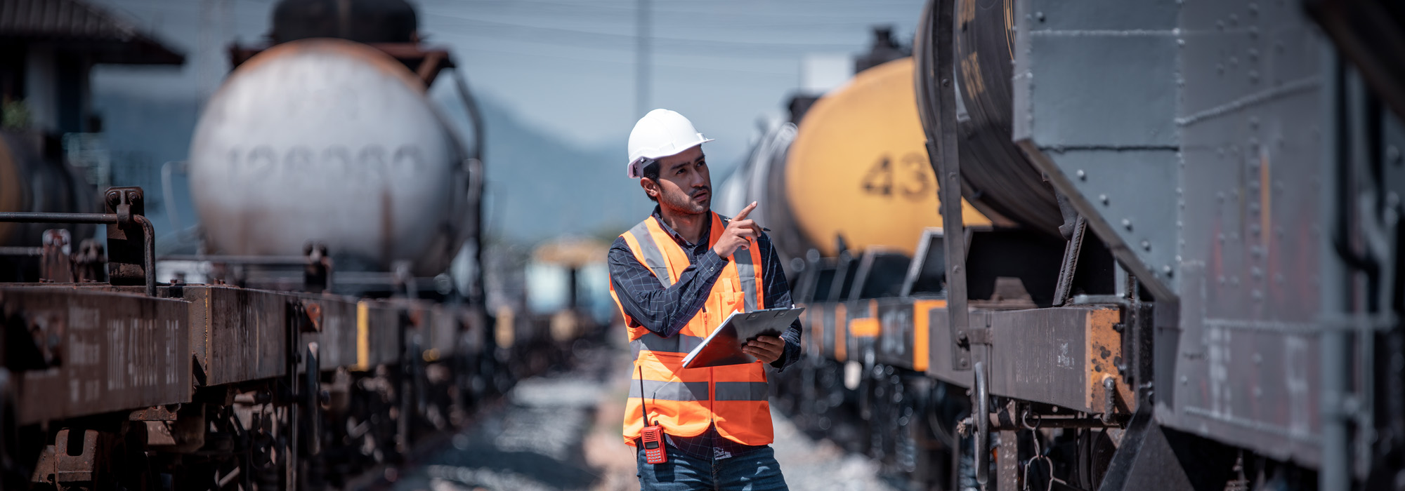 engineer under inspection and checking construction process railway switch