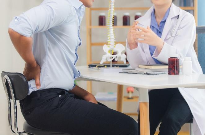 patient holding back