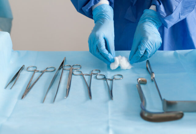 surgeon preparing tools
